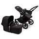 Black/Midnight Black Mono - Bugaboo Donkey 5 shown with seat and carrycot with chassis